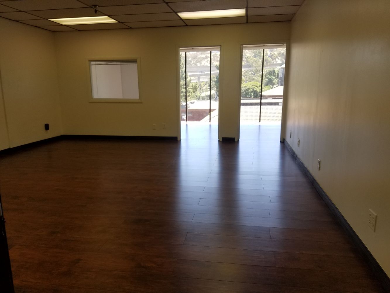 2 LARGE PRIVATE OFFICES WITH WINDOWS AND OPEN AREA.